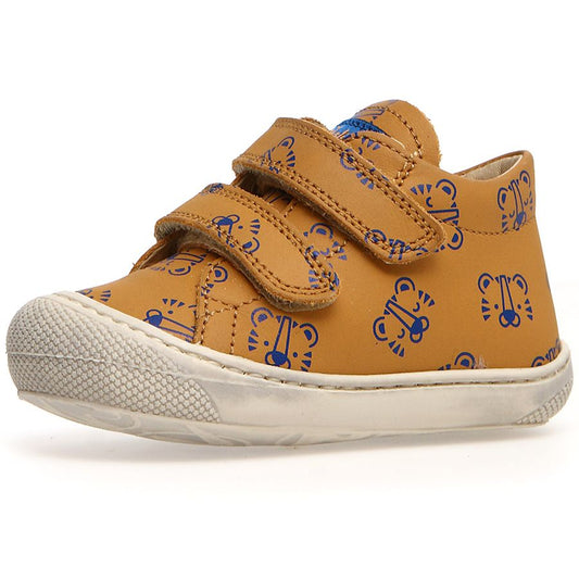 A close-up image of the NATURINO Halbschuh COCOON in curry color, featuring a tiger print design, a comfortable and stylish option for children's footwear